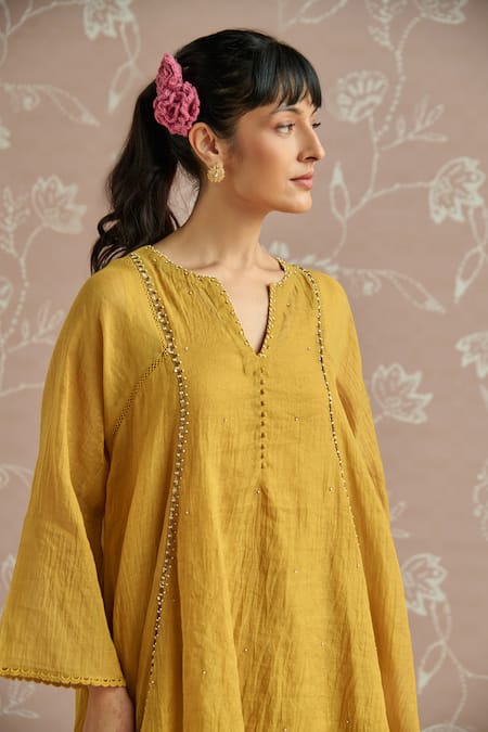 Kritika Dawar Mustard Tissue, Chanderi Sequins V-neck Zaina Hand Embroidered Kurta Set at Aza Fashions Kritika Dawar_Mustard Tissue, Chanderi Sequins V-neck Zaina Hand Embroidered Kurta Set _at_Aza_Fashions