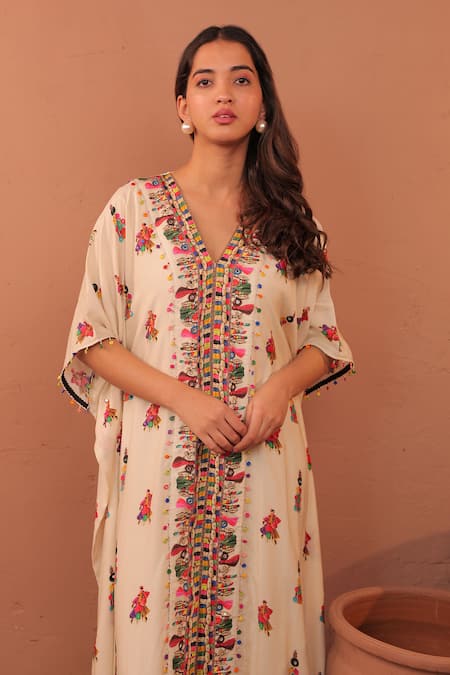 Buy_Surkh Syahi_Off White Muslin Mirrors, Tassels, Beads V-neck Albeli Long Kaftan _Online_at_Aza_Fashions