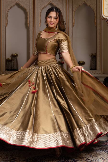 Buy Pomcha Jaipur Gold Taffeta, Silk, Net Gota Patti Round Neck Lehenga Set Online at Aza Fashions Buy_Pomcha Jaipur_Gold Taffeta, Silk, Net Gota Patti Round Neck Lehenga Set _Online_at_Aza_Fashions