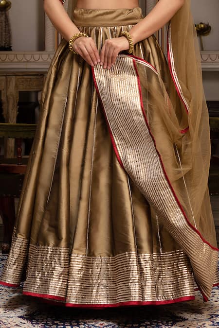 Shop Pomcha Jaipur Gold Taffeta, Silk, Net Gota Patti Round Neck Lehenga Set Online at Aza Fashions Shop_Pomcha Jaipur_Gold Taffeta, Silk, Net Gota Patti Round Neck Lehenga Set _Online_at_Aza_Fashions