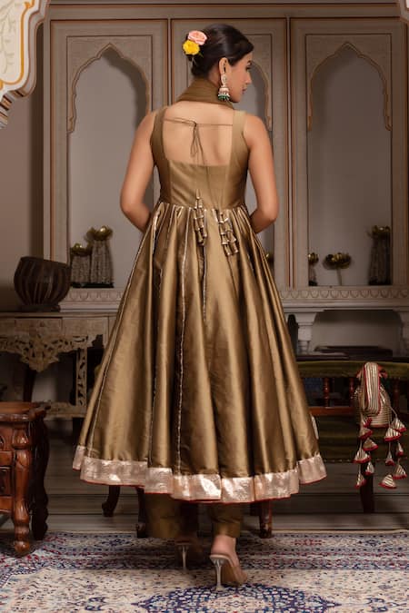 Shop_Pomcha Jaipur_Gold Taffeta, Silk, Net Gota Patti, Tassels Sweetheart Neck Anarkali Set _at_Aza_Fashions