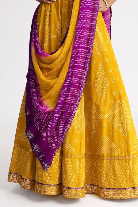 Buy_Naina Jain_Yellow Crepe, Chiffon Mirrors V-neck Bandhani Lehenga Set _Online_at_Aza_Fashions