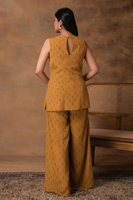 ISHA GUPTA TAYAL Mustard Gold Peplum Top & Pant Set 