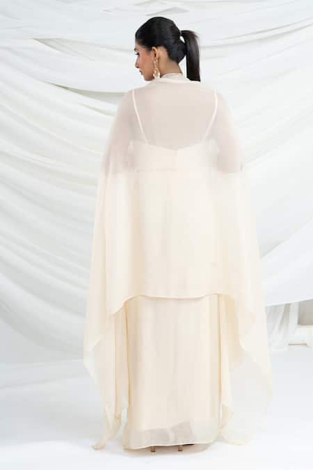 Ellemora Fashions Off White Viscose Georgette Embroidery, Beads, Tassels, Sequins Shrug Skirt Set Online at Aza Fashions Ellemora Fashions_Off White Viscose Georgette Embroidery, Beads, Tassels, Sequins Shrug Skirt Set _Online_at_Aza_Fashions