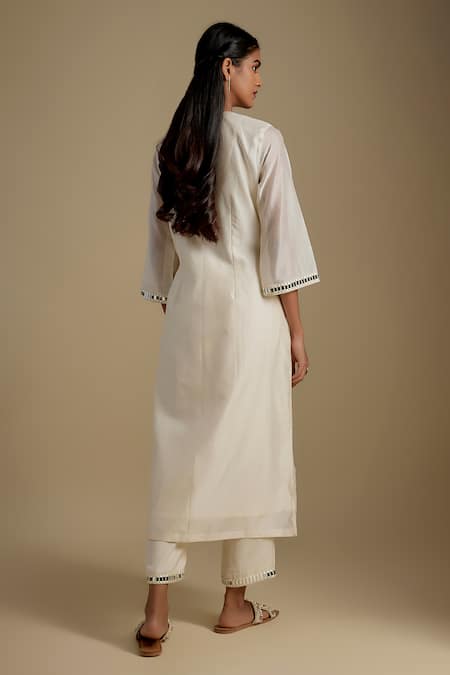 Shop Asaga Ivory Chanderi, Muslin, Organza Mirrors V-neck Outflair Work Kurta Set at Aza Fashions Shop_Asaga_Ivory Chanderi, Muslin, Organza Mirrors V-neck Outflair Work Kurta Set _at_Aza_Fashions