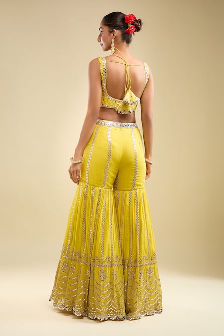 Shop Samyukta Singhania Yellow Georgette, Net Sequins, Beads V-neck Embroidered Blouse Gharara Set at Aza Fashions Shop_Samyukta Singhania_Yellow Georgette, Net Sequins, Beads V-neck Embroidered Blouse Gharara Set _at_Aza_Fashions