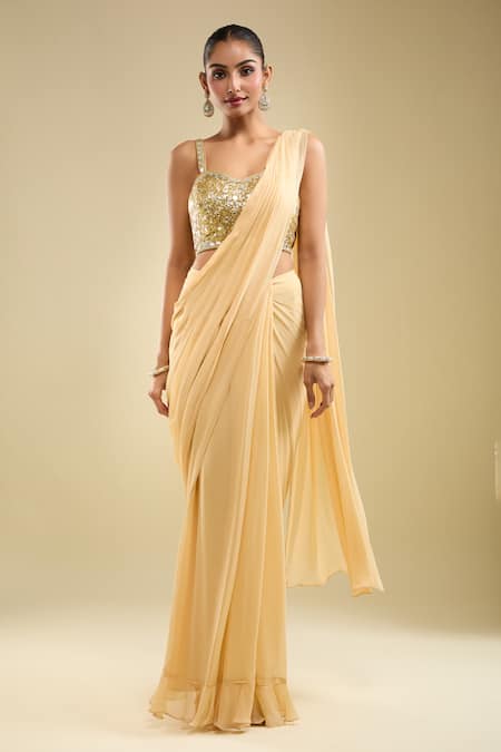 Samyukta Singhania_Beige Georgette Sequins Round Neck Pre-draped Saree With Embroidered Blouse _at_Aza_Fashions