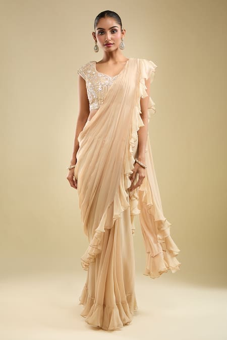 Samyukta Singhania Beige Georgette Embroidery Leaf Neck Ruffle Pre-draped Saree With Blouse at Aza Fashions Samyukta Singhania_Beige Georgette Embroidery Leaf Neck Ruffle Pre-draped Saree With Blouse _at_Aza_Fashions