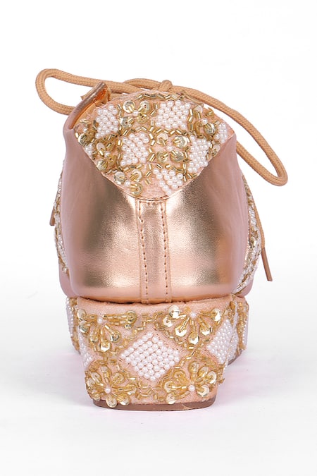 Shop_Fuchsia by aashaka mehta_Rose Gold Pearl Embroidered Sneaker Wedges _Online_at_Aza_Fashions