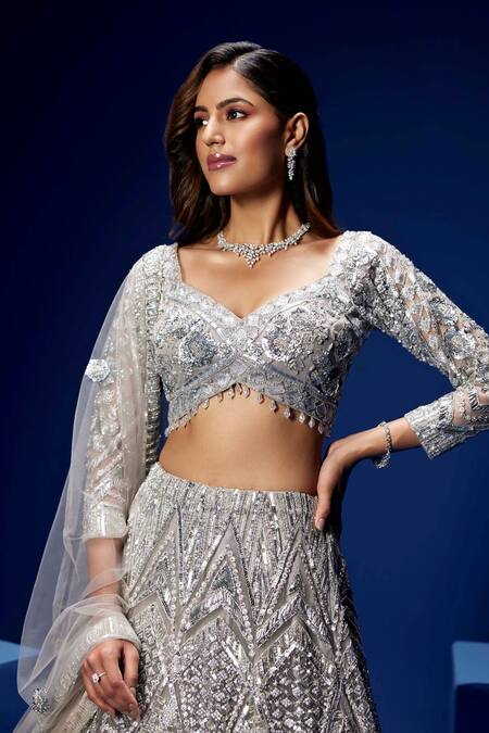 Buy Opus Atelier Silver Net, Tulle Sequins, Embroidery V-neck Zephyr Lehenga Set Online at Aza Fashions Buy_Opus Atelier_Silver Net, Tulle Sequins, Embroidery V-neck Zephyr Lehenga Set _Online_at_Aza_Fashions