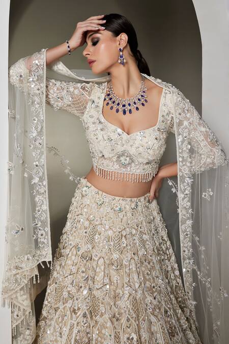 Buy_Opus Atelier_Ivory Tulle, Net Embroidery, Sequins, Beads, Tassels Light Valerie Lehenga Set _Online_at_Aza_Fashions