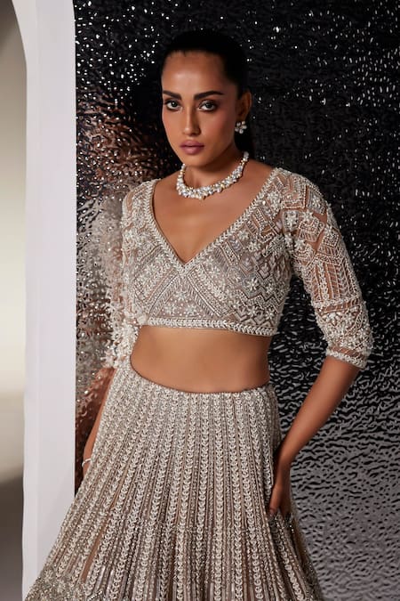 Opus Atelier_Ivory Net, Tulle Beads, Sequins, Embroidery V-neck Mouse Charlotte Lehenga Set _Online_at_Aza_Fashions