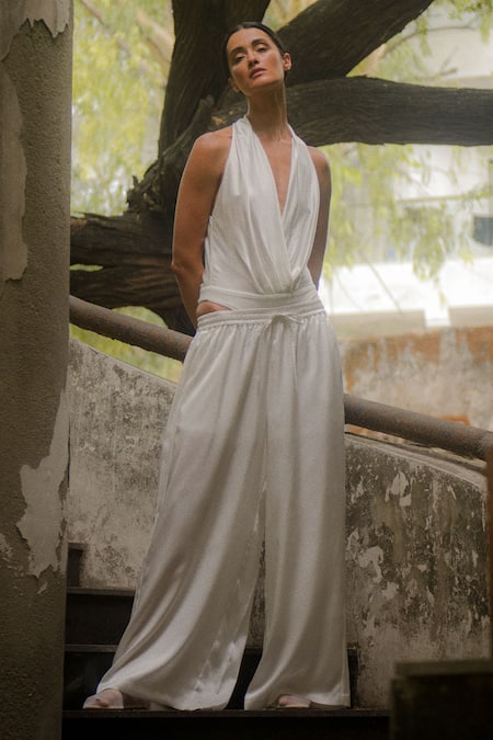 Shop Ituvana White Silk Halter Neck Gabby Bodysuit And Pant Set Online at Aza Fashions Shop_Ituvana_White Silk Halter Neck Gabby Bodysuit And Pant Set _Online_at_Aza_Fashions