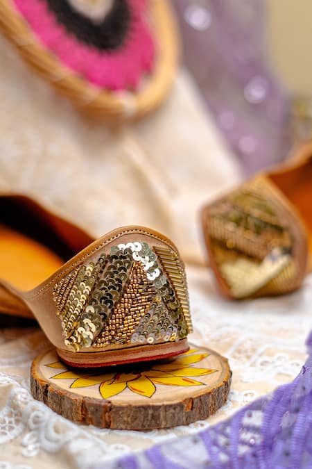 NR By Nidhi Rathi_Gold Handcrafted Juttis_at_Aza_Fashions