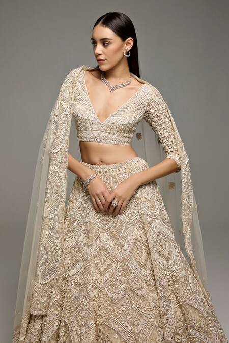 Opus Atelier_Beige Net, Tulle Embroidery, Sequins V-neck Marisol Lehenga Set _Online_at_Aza_Fashions