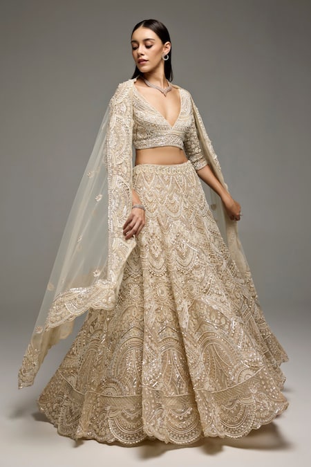 Shop_Opus Atelier_Beige Net, Tulle Embroidery, Sequins V-neck Marisol Lehenga Set _Online_at_Aza_Fashions