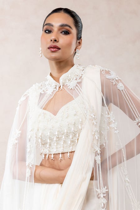 Libas Cafe by Nidhi & Ashish_Ivory Crepe Pearls, Beads, Embroidery High Neck, Hand Work Cape Saree Set _Online_at_Aza_Fashions