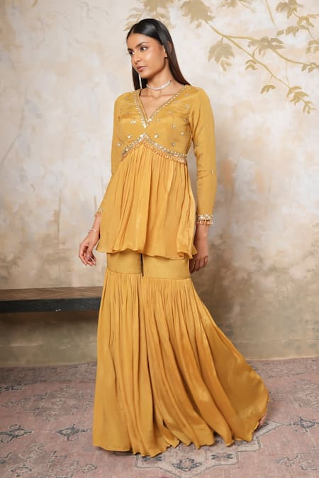Shop_Libas Cafe by Nidhi & Ashish_Mustard Crepe Embroidery, Sequins V-neck Hand Kurta And Gharara Set _at_Aza_Fashions