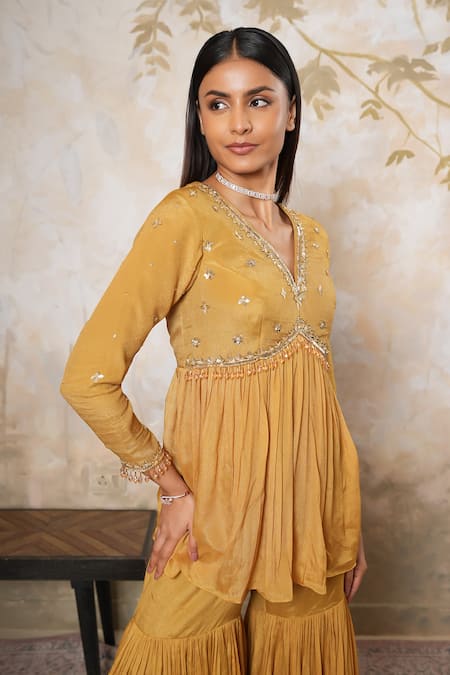 Buy_Libas Cafe by Nidhi & Ashish_Mustard Crepe Embroidery, Sequins V-neck Hand Kurta And Gharara Set _Online_at_Aza_Fashions