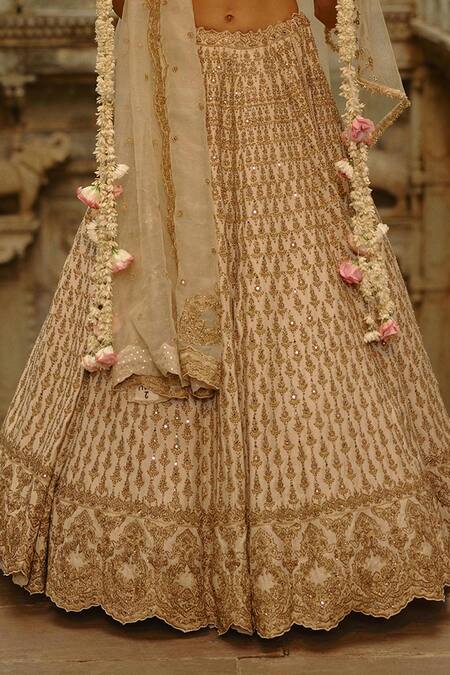 Nitika Gujral_Cream Silk, Organza Embroidery, Mirrors, Zari, Pearls, Hand Bridal Lehenga Set _at_Aza_Fashions