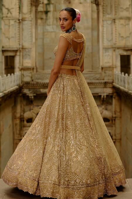 Buy Nitika Gujral Gold Net Crystals, Beads, Sequins, Embroidery Sweetheart Neck Bridal Lehenga Set Online at Aza Fashions Buy_Nitika Gujral_Gold Net Crystals, Beads, Sequins, Embroidery Sweetheart Neck Bridal Lehenga Set _Online_at_Aza_Fashions
