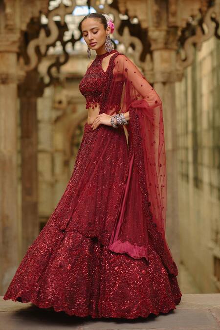 Nitika Gujral_Burgundy Net Beads, Sequins, Cut Work, Embroidery Halter Embellished Lehenga Set _at_Aza_Fashions