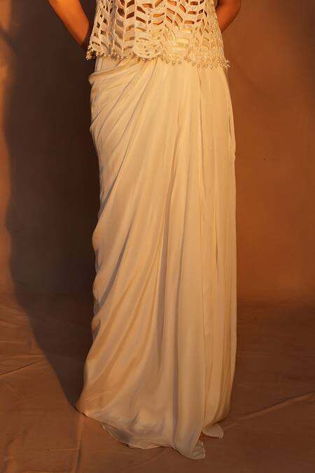 Ashutosh Joshi_Ivory Net, Crepe Embroidery, Pearls, Cut Work, Beads, Abstract Top And Skirt Set _Online_at_Aza_Fashions