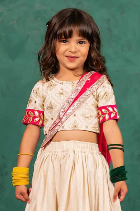 JILMIL DREAMWEAR Off White Georgette Gota Patti, Mirrors, Embroidery, Zari Lehenga Set Online at Aza Fashions JILMIL DREAMWEAR_Off White Georgette Gota Patti, Mirrors, Embroidery, Zari Lehenga Set _Online_at_Aza_Fashions