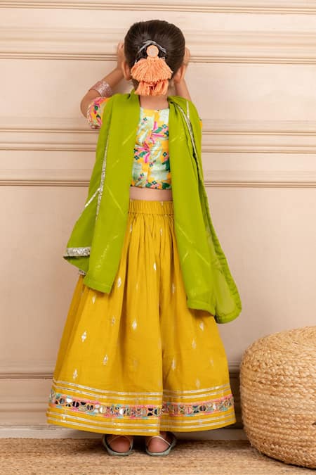 Shop JILMIL DREAMWEAR Yellow Polyester Embroidery, Mirrors, Zari Printed Blouse Lehenga Set at Aza Fashions Shop_JILMIL DREAMWEAR_Yellow Polyester Embroidery, Mirrors, Zari Printed Blouse Lehenga Set _at_Aza_Fashions