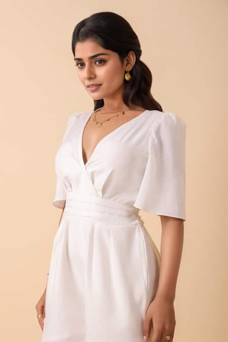 Shop_Naintara Bajaj_White Rayon V-neck Ivory Playsuit _Online_at_Aza_Fashions