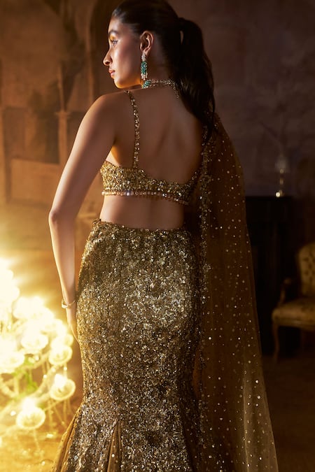 Seema Gujral Gold Net Crystals, Sequins, Beads, Tassels Plunge Antique Fit And Flare Skirt Set Online at Aza Fashions Seema Gujral_Gold Net Crystals, Sequins, Beads, Tassels Plunge Antique Fit And Flare Skirt Set _Online_at_Aza_Fashions