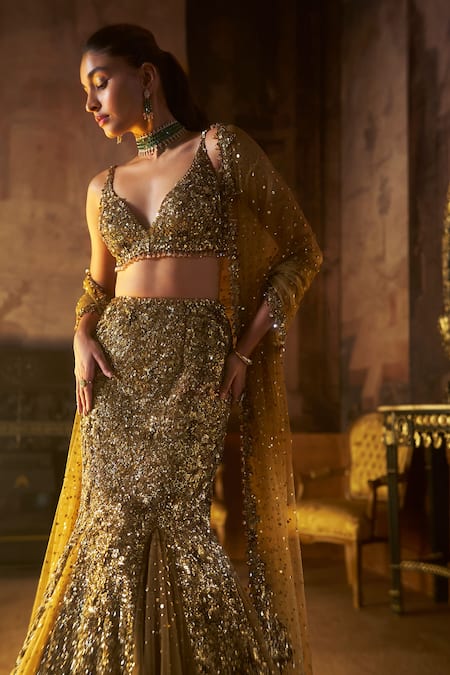 Buy Seema Gujral Gold Net Crystals, Sequins, Beads, Tassels Plunge Antique Fit And Flare Skirt Set Online at Aza Fashions Buy_Seema Gujral_Gold Net Crystals, Sequins, Beads, Tassels Plunge Antique Fit And Flare Skirt Set _Online_at_Aza_Fashions