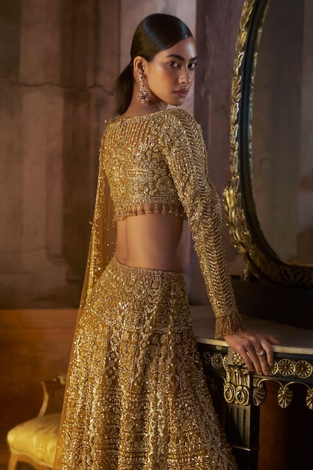 Seema Gujral_Gold Net Crystals, Beads, Sequins, Embroidery, Tassels Tonal Slit Skirt Set _Online_at_Aza_Fashions
