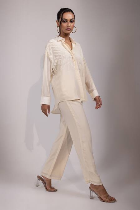 Shop Yoseba Ivory Crepe Beads, Tassels Collared Kaddana Shirt And Pant Set Online at Aza Fashions Shop_Yoseba_Ivory Crepe Beads, Tassels Collared Kaddana Shirt And Pant Set _Online_at_Aza_Fashions