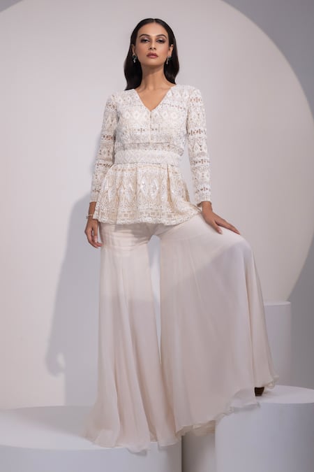 Shop Yoseba Ivory Net, Organza Embroidery V-neck Lace Embellished Peplum Top With Sharara Online at Aza Fashions Shop_Yoseba_Ivory Net, Organza Embroidery V-neck Lace Embellished Peplum Top With Sharara _Online_at_Aza_Fashions