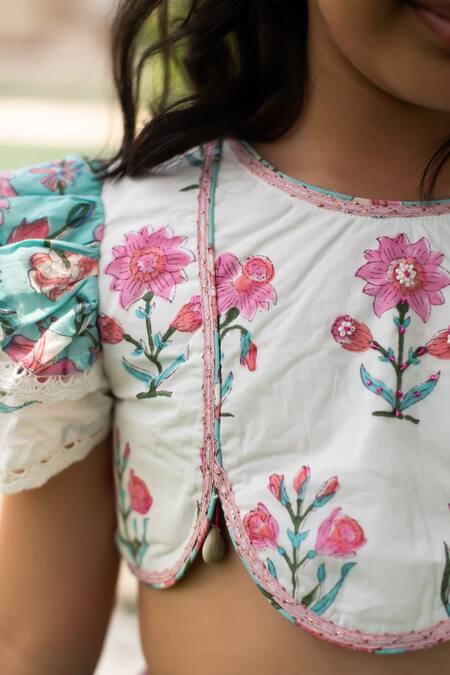 Plumcheeks_White Cotton Tassels, Ruffles Printed Blouse And Skirt Set _Online_at_Aza_Fashions