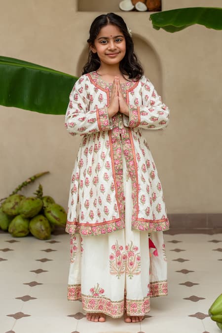 Plumcheeks Off White Cotton Embroidery, Tassels Manika Printed Top And Skirt Set Online at Aza Fashions Plumcheeks_Off White Cotton Embroidery, Tassels Manika Printed Top And Skirt Set _Online_at_Aza_Fashions