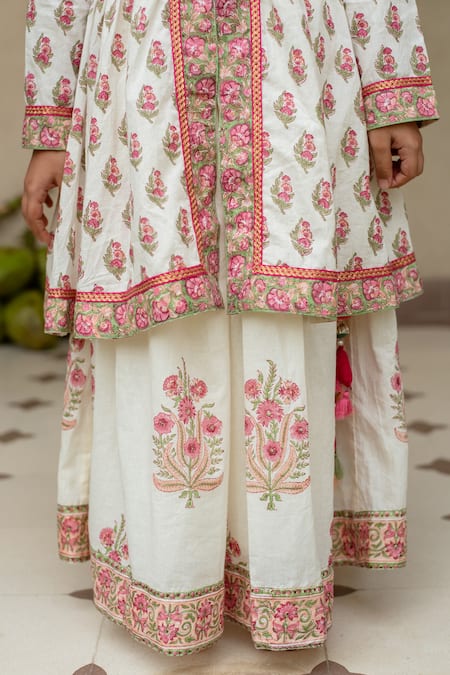 Plumcheeks Off White Cotton Embroidery, Tassels Manika Printed Top And Skirt Set at Aza Fashions Plumcheeks_Off White Cotton Embroidery, Tassels Manika Printed Top And Skirt Set _at_Aza_Fashions