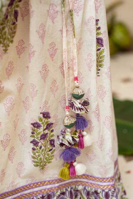 Plumcheeks_Off White Cotton Lace, Tassels Jamuni Printed Blouse And Skirt Set _at_Aza_Fashions