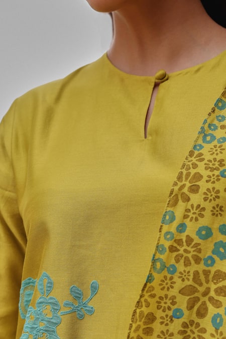 Vaayu Yellow Silk Applique, Embroidery, Tassels Keyhole Neck Ochre Kurta Set at Aza Fashions Vaayu_Yellow Silk Applique, Embroidery, Tassels Keyhole Neck Ochre Kurta Set _at_Aza_Fashions