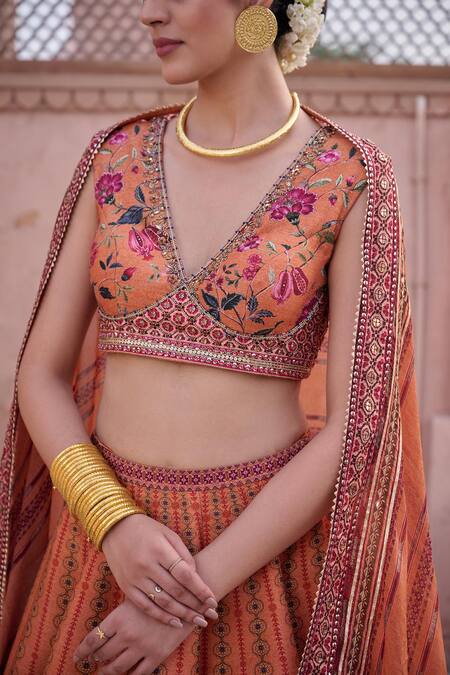 Irrau By Samir Mantri_Peach Dupion, Organza Embroidery, Tassels, Zari V-neck Parijat Lehenga Set _at_Aza_Fashions