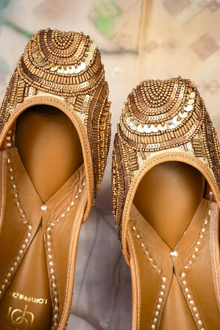 Shop_Loryphilory_Gold Sunheri Shaan Embroidered Juttis _Online_at_Aza_Fashions