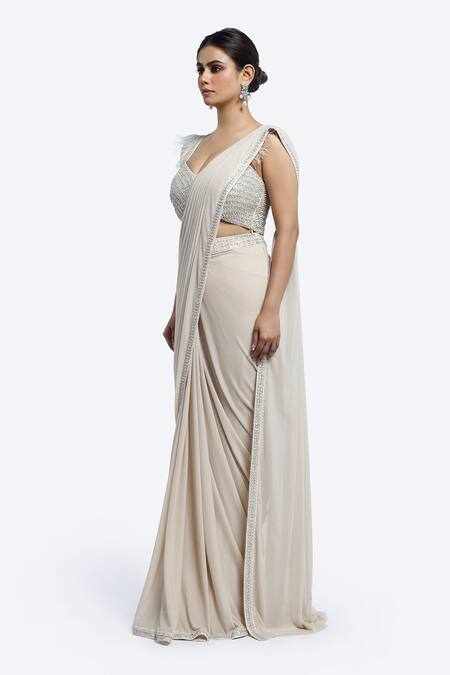 Buy_Onaya_Ivory Lycra, Net Feathers, Beads, Cutdana Work Blouse And Pre-draped Saree Set _Online_at_Aza_Fashions