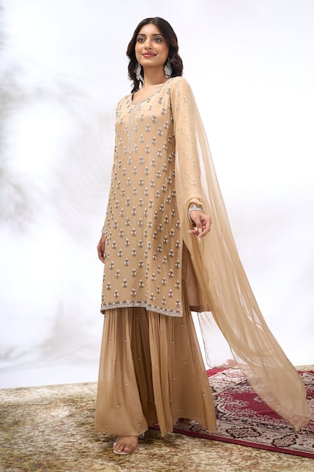 Buy Samyukta Singhania Beige Georgette Embroidery, Sequins Round Neck Kurta And Sharara Set Buy_Samyukta Singhania_Beige Georgette Embroidery, Sequins Round Neck Kurta And Sharara Set