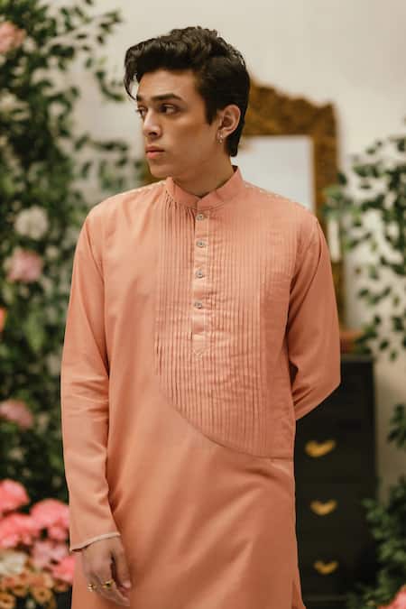Vaani Beswal Peach Cotton Carl Asymmetric Pleated Panel Kurta Online at Aza Fashions Vaani Beswal_Peach Cotton Carl Asymmetric Pleated Panel Kurta _Online_at_Aza_Fashions