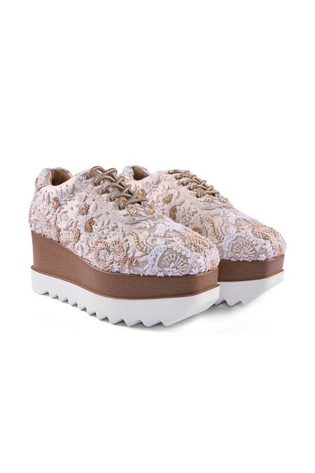 Anaar_Off White Galentine Wedge Embroidered Sneakers _at_Aza_Fashions
