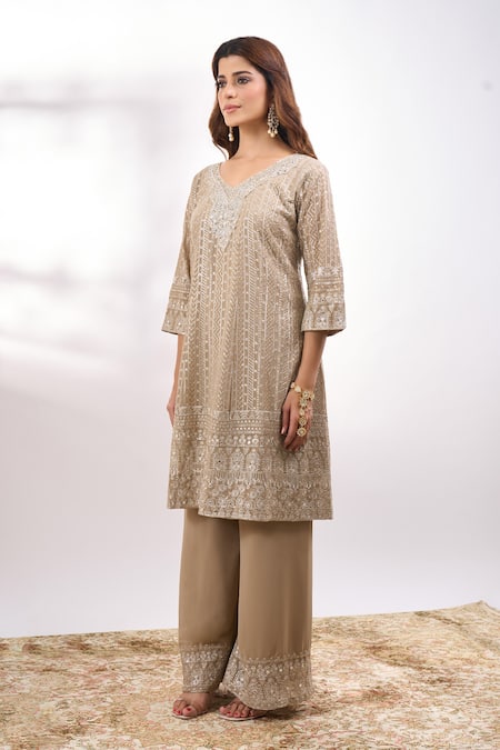 Alaya Advani Beige Georgette Embroidery, Sequins V-neck Metallic Kurta Set at Aza Fashions Alaya Advani_Beige Georgette Embroidery, Sequins V-neck Metallic Kurta Set _at_Aza_Fashions