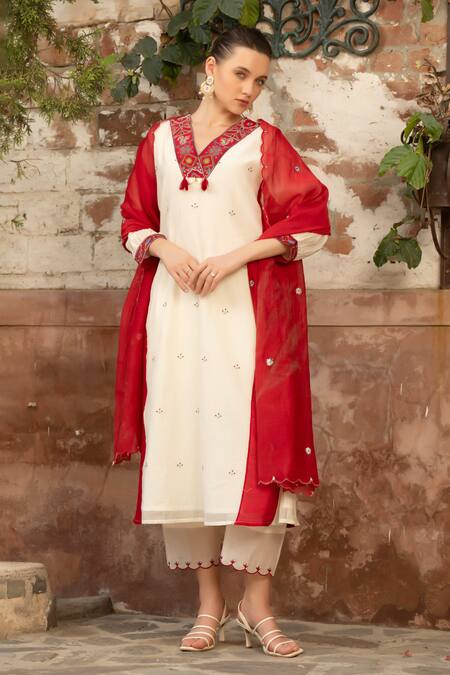 Amoree by Shikha Chaudhry Ivory Cotton Embroidery, Tassels, Sequins V-neck Royal Charm Kali Kurta Set at Aza Fashions Amoree by Shikha Chaudhry_Ivory Cotton Embroidery, Tassels, Sequins V-neck Royal Charm Kali Kurta Set _at_Aza_Fashions