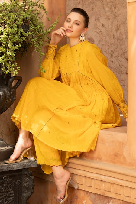 Shop_Amoree by Shikha Chaudhry_Mustard Cotton Embroidery Round Neck Marigold Charm Kurta With Pant _Online_at_Aza_Fashions
