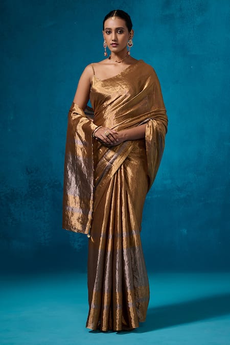 Buy_Dressfolk_Gold Tissue Isha Handwoven Saree With Unstitched Blouse Piece _Online_at_Aza_Fashions